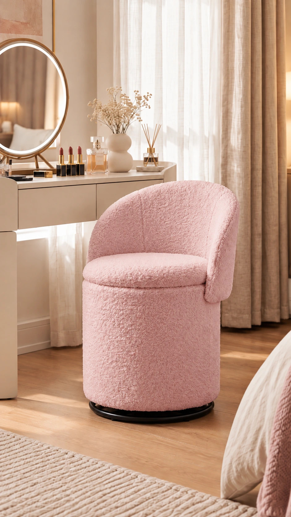 Pink rounded vanity chair beside a dressing table