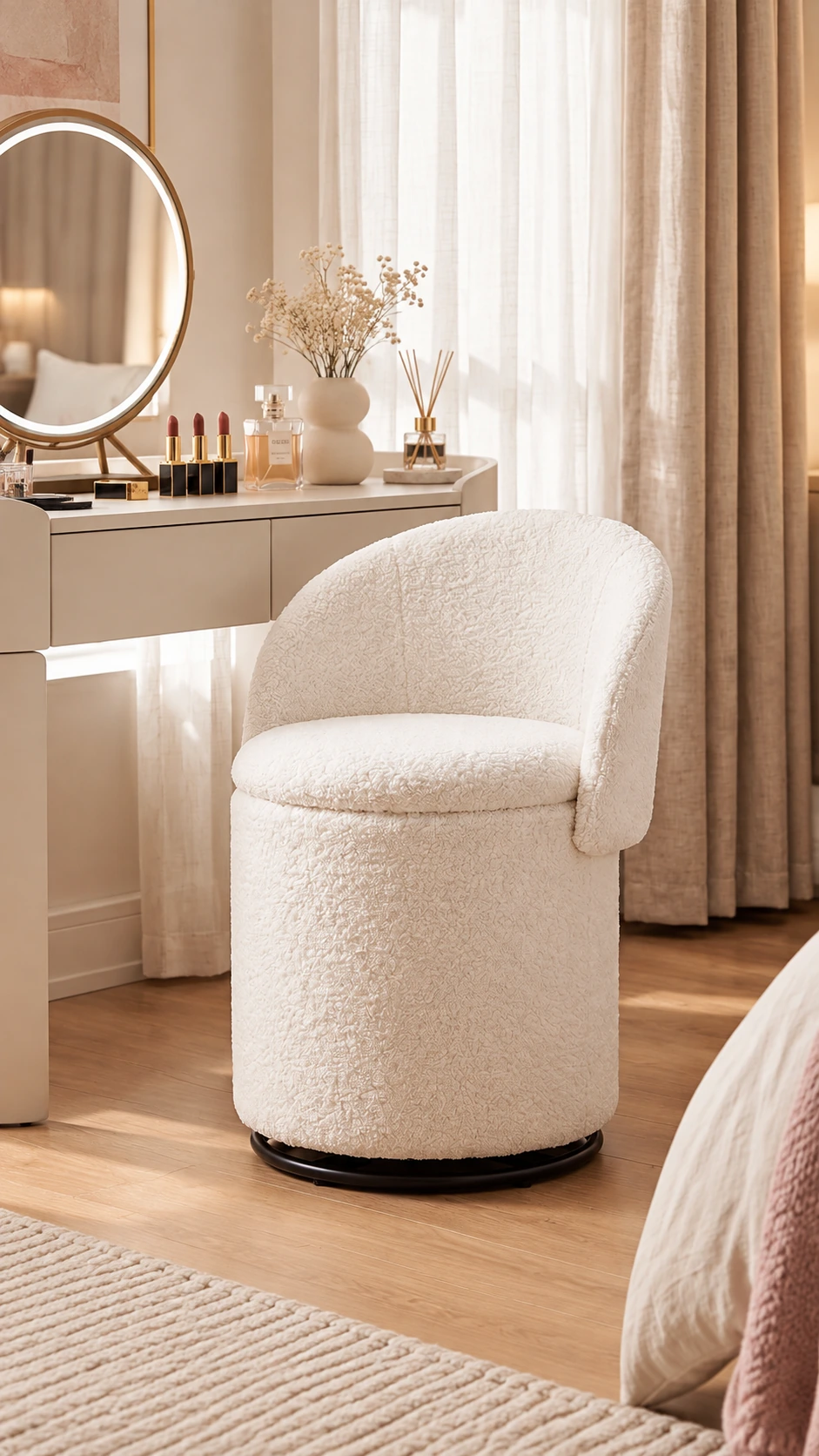 White rounded vanity chair beside a dressing table